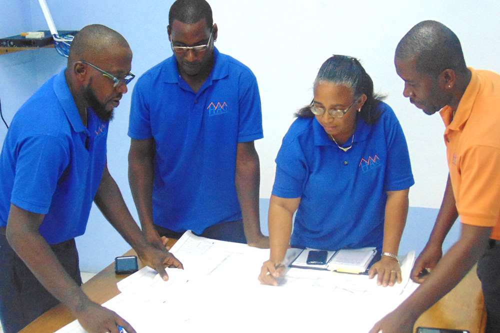 HAG colleagues reviewing plans